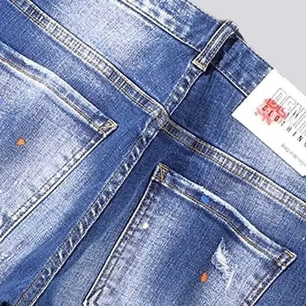 Whiskered medium wash jeans
 for men