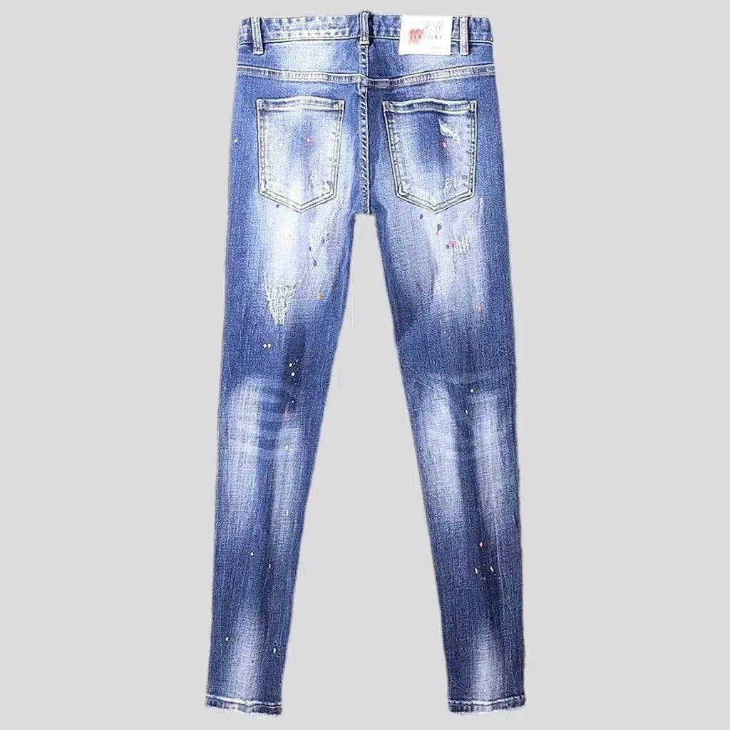 Whiskered medium wash jeans
 for men
