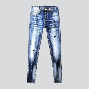 Whiskered medium wash jeans
 for men