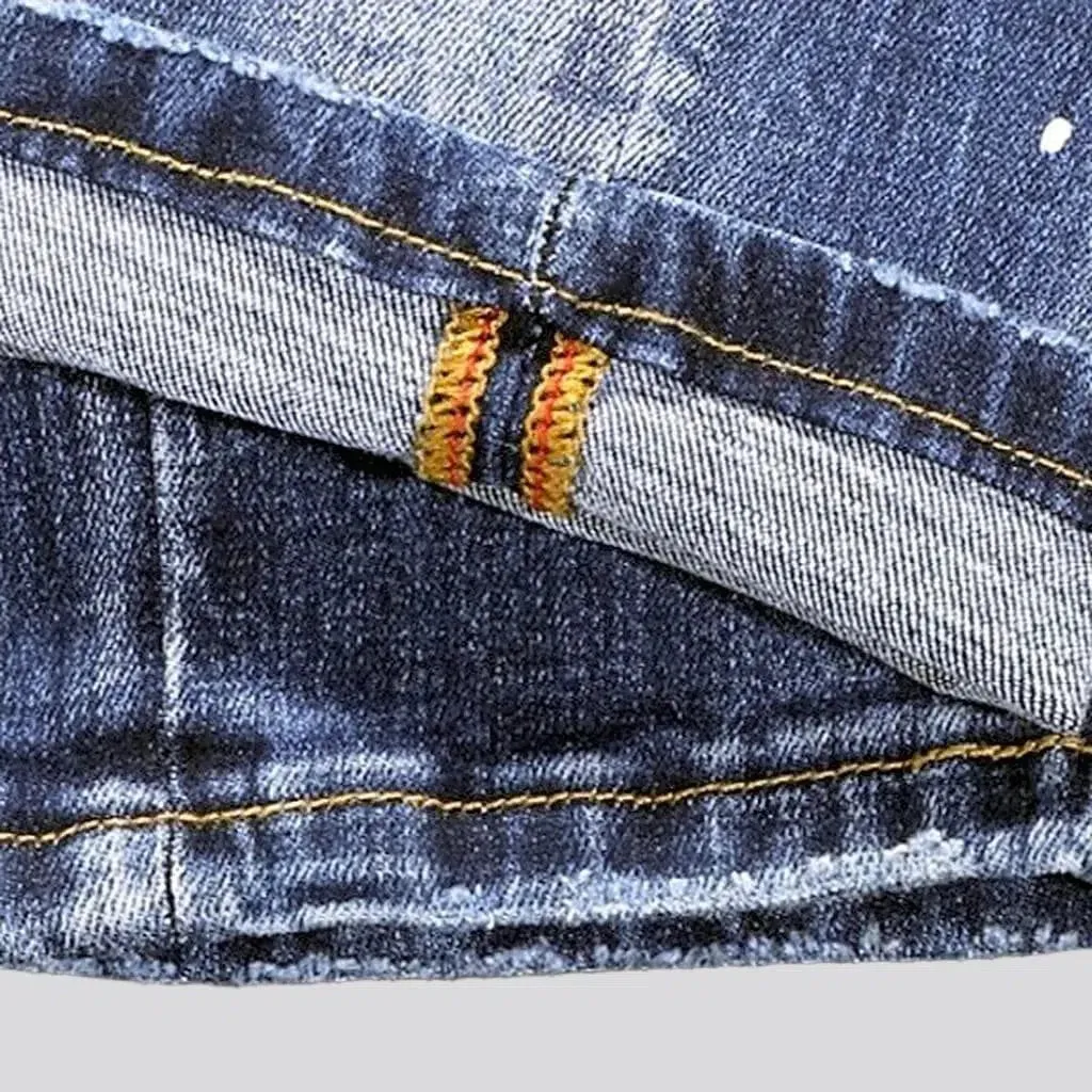 Whiskered medium wash jeans
 for men